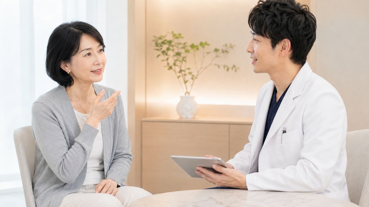 口横のたるみのよくある質問に答える医師と患者